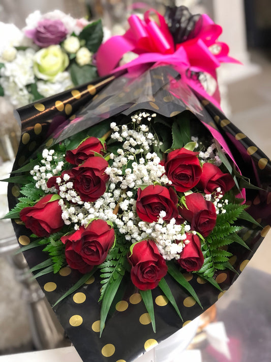Dozen premium red roses wrapped